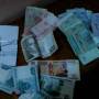 В Жмеринці поліція накрила валютника з купою грошей