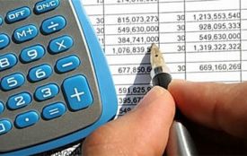 Налогов в облбюджете-2015 прибавилось в гривнах и убавилось в долларах США