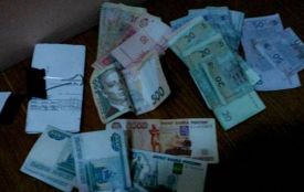 В Жмеринці поліція накрила валютника з купою грошей